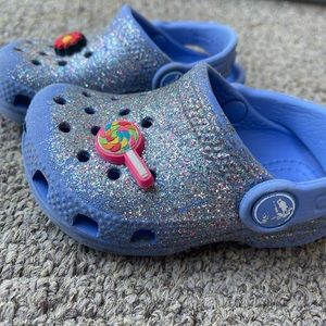 Baby crocs charms included